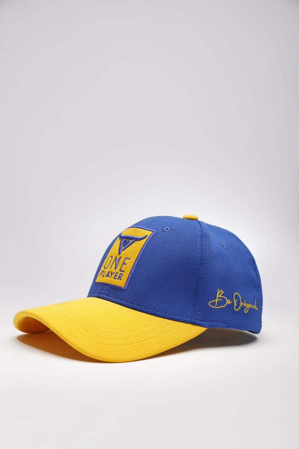 Unisex Yellow Blue Solid Baseball cap has a visor by One Player