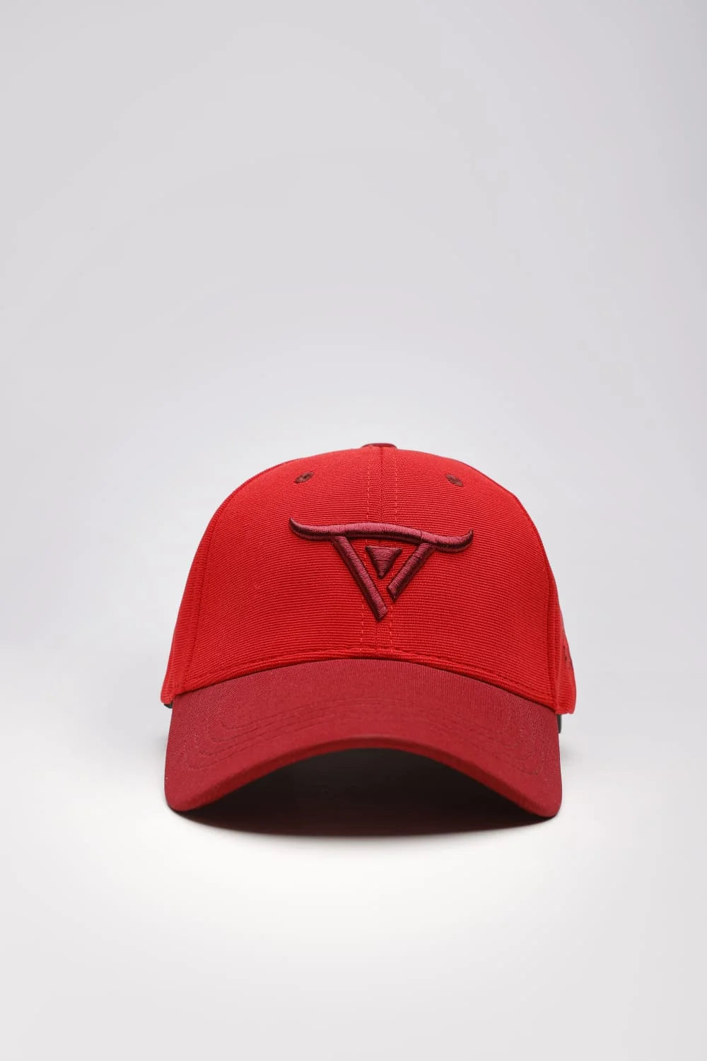 Unisex Red solid baseball cap, has a visor by One Player